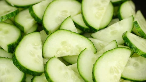 Chopped cucumbers close up, rotation Stock Footage 247256833