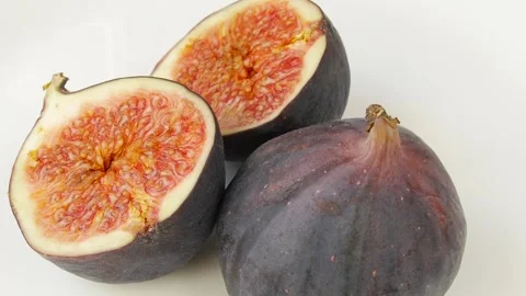 Chopped figs on a plate. Video stock 328441170
