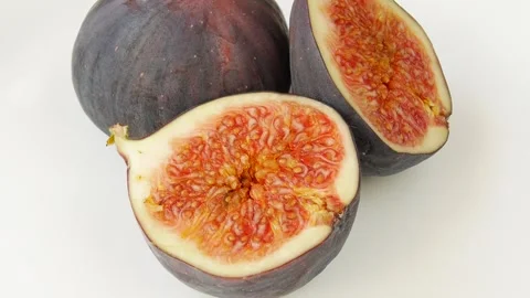 Chopped figs on a plate. Video stock 328441174