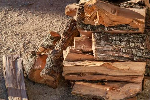 Chopped fire wood stack outdoor. Stock Photos