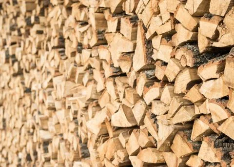 Chopped Fire Wood in a Stack Stock Photos