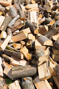 Chopped firewood on a stack. Stock Photos