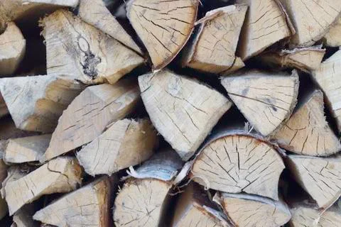 Chopped firewood on a stack Stock Photos