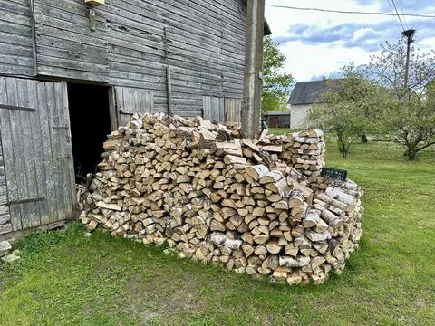 Chopped Firewood Stack Ready for Winter Heating Stock Photos