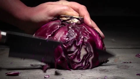 Chopped fresh red cabbage. Prepare sliced vegetable for cooking purple cabbag Stock Footage 130376562
