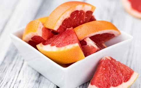 Chopped Grapefruits (selective focus) Stock Photos