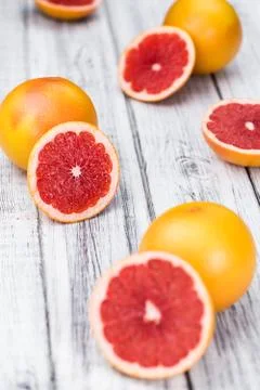 Chopped Grapefruits (selective focus) Stock Photos