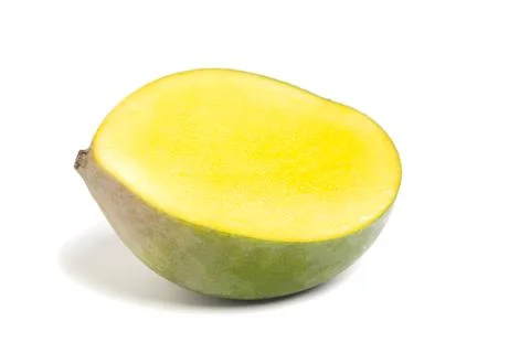 Chopped half of ripe mango fruit isolated on white background Stock-Fotos