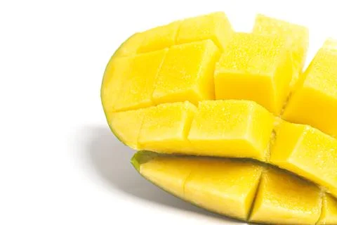 Chopped half of ripe mango fruit isolated on white background. Stock Photos