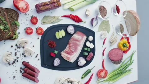 Chopped meat and vegetables on plastic cutting board Stock Footage 232394332