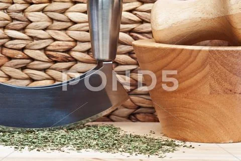 Chopped mint with herb chopper and pestle and mortar Stock Photos