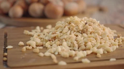 Chopped nuts for baking in the kitchen Stock Footage 337982539