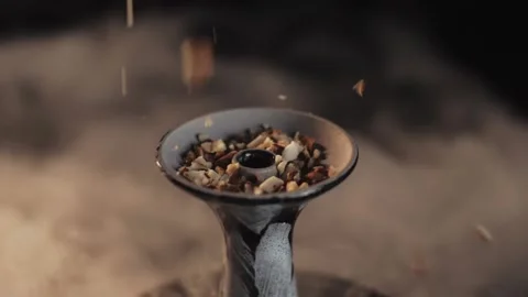 Chopped nuts spill out. Hookah. Shisha Stock Footage 198179473