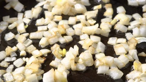 Chopped Onion on Frying Pan Stock Footage 72690647