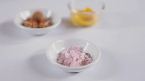 Chopped onion isolated white background, slider shoot Stock Footage 130840734
