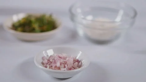 Chopped onion isolated white background, slider shoot Stock Footage 130842941