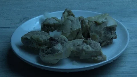 Chopped onions fall on boiled chicken meat Stock Footage 79724998