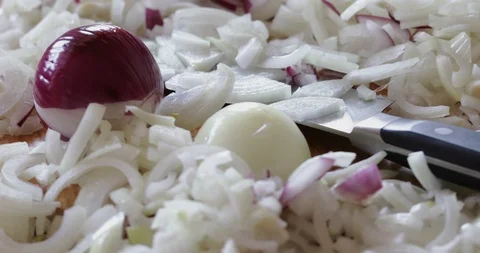Chopped onions on rotating stand, close up, no people Stock Footage 121309235