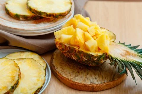 Chopped pineapple salad in half pineapple. Fresh delicious pineapple cut into Stock Photos