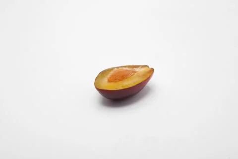 Chopped plum on a white background Stock Photos