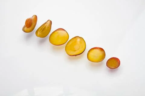 Chopped plum on a white background Stock Photos