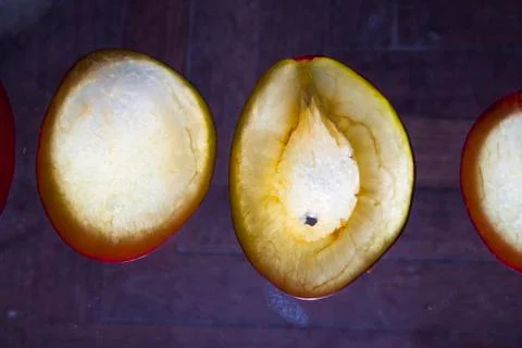 Chopped plum on a white background Stock Photos