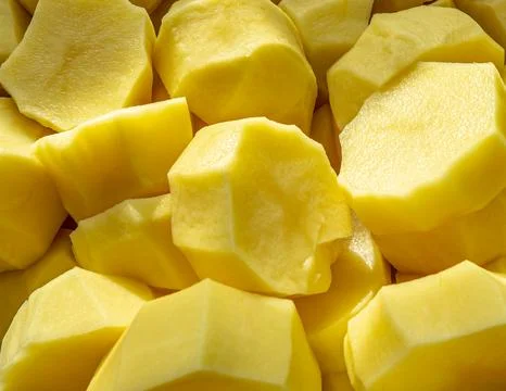 Chopped potatoes in a pan Stock Photos