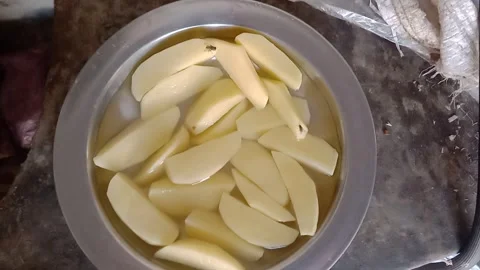 Chopped Potatoes on a Plate Video stock 346990318