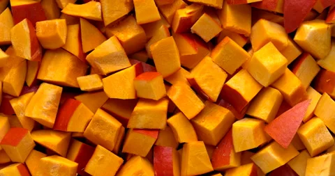Chopped red kuri squash chunks. Stock Footage 282796458