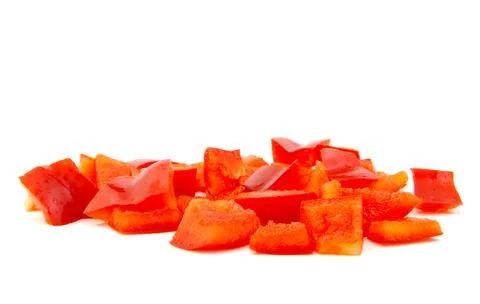 Chopped red pepper on white background. Stock Photos