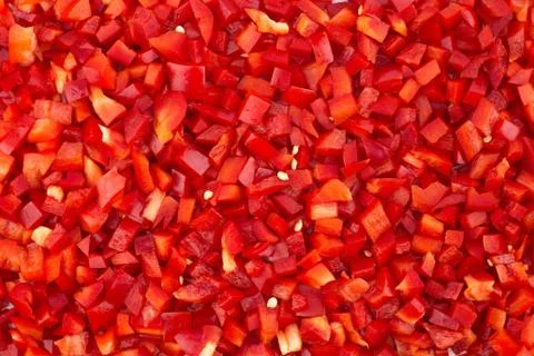 Chopped red peppers texture background. Stock Photos