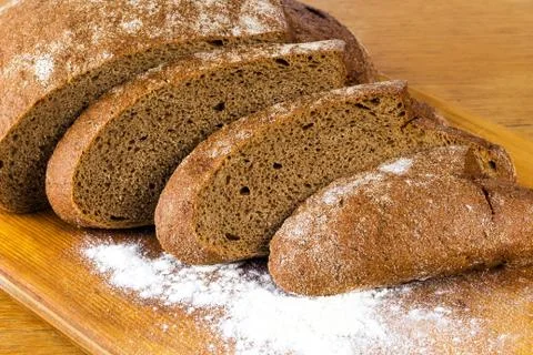 Chopped rye bread board Stock Photos