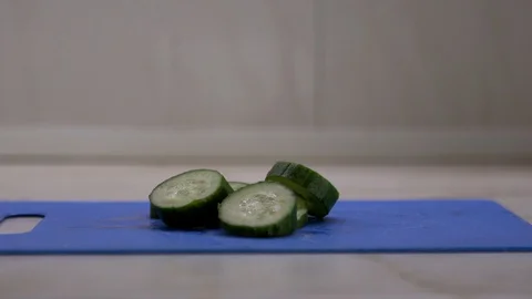 Chopped slices of cucumber. Stock Footage 130168488