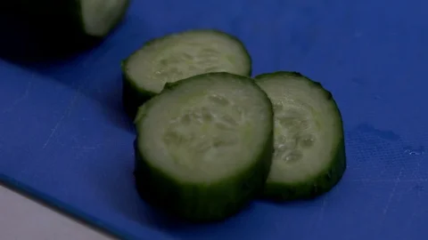 Chopped slices of cucumber. Stock Footage 130170371