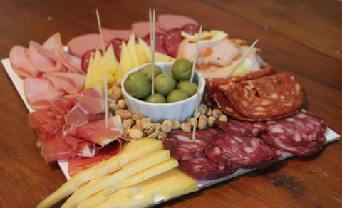 Chopped table of cold cuts with beer Stock Photos