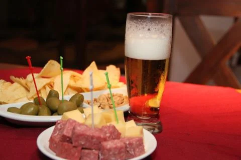 Chopped table of cold cuts with beer Stock Photos