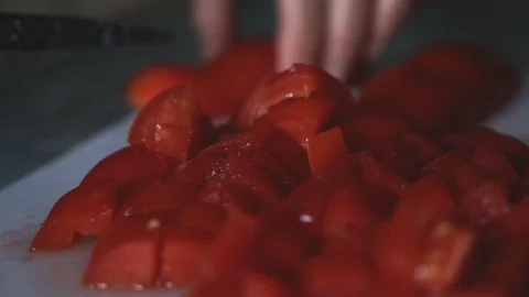 Chopped Tomato on Cutting Board Video stock 99244778
