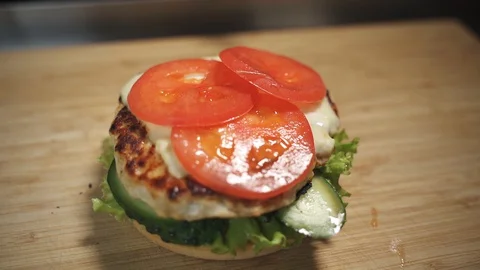 Chopped tomatoes fall Stock Footage 129685526