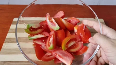 Chopped Tomatoes inside a Bowl Stock Footage 159292154