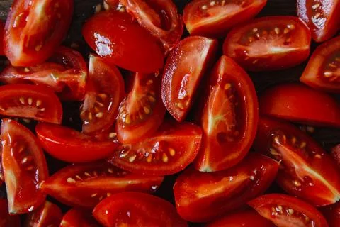 Chopped tomatoes pieces texture pattern. Food vegetable ingredient cutted i.. Stock Photos