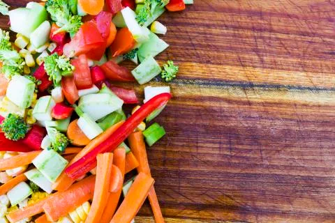 Chopped vegetables on the board Stock Photos