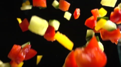 Chopped Vegetables Mix Falls in Slow Motion Closeup Stock Footage 68672199