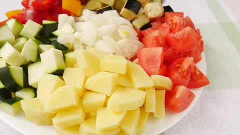 Chopped vegetables on a plate. Stock Footage 247816203