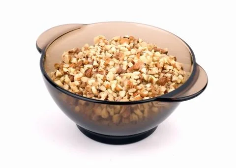 Chopped walnuts in a vase Foto stock