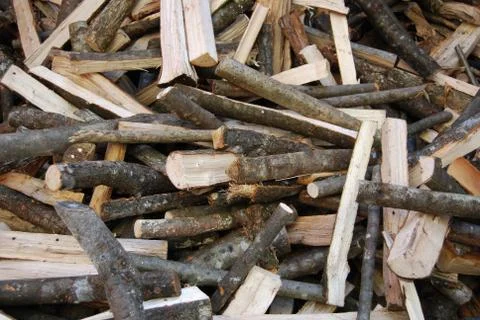 Chopped wood background. Stack of firewood Stock Photos