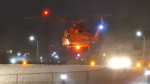 Chopper hovering above helipad and taking off - 24fps 1080p Stock Footage 91568200