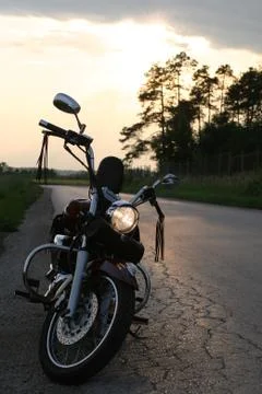 Chopper motorcycle at the sunset Stock Photos