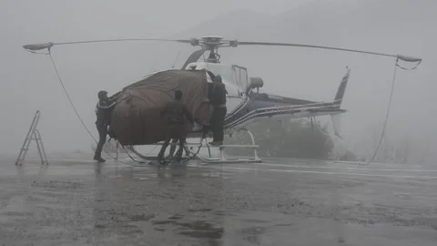 Chopper not flying because of rainy weather Stock Footage 196204015