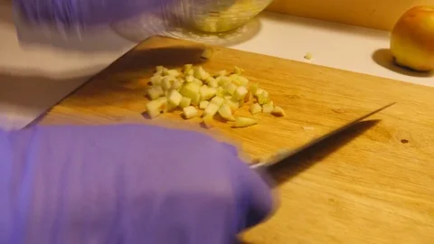 Chopping apple on chopping board Stock Footage 83932503