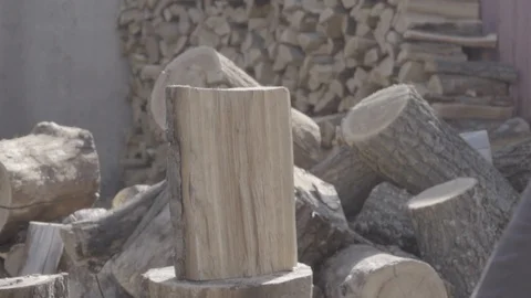 Chopping ax with a log in slow motion Stock Footage 127714082